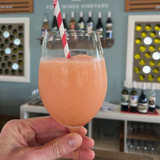 A glass of frose at Four Winds Cellar Door