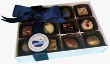 Load image into Gallery viewer, A gift box of handmade chocolate truffles with a blue ribbon
